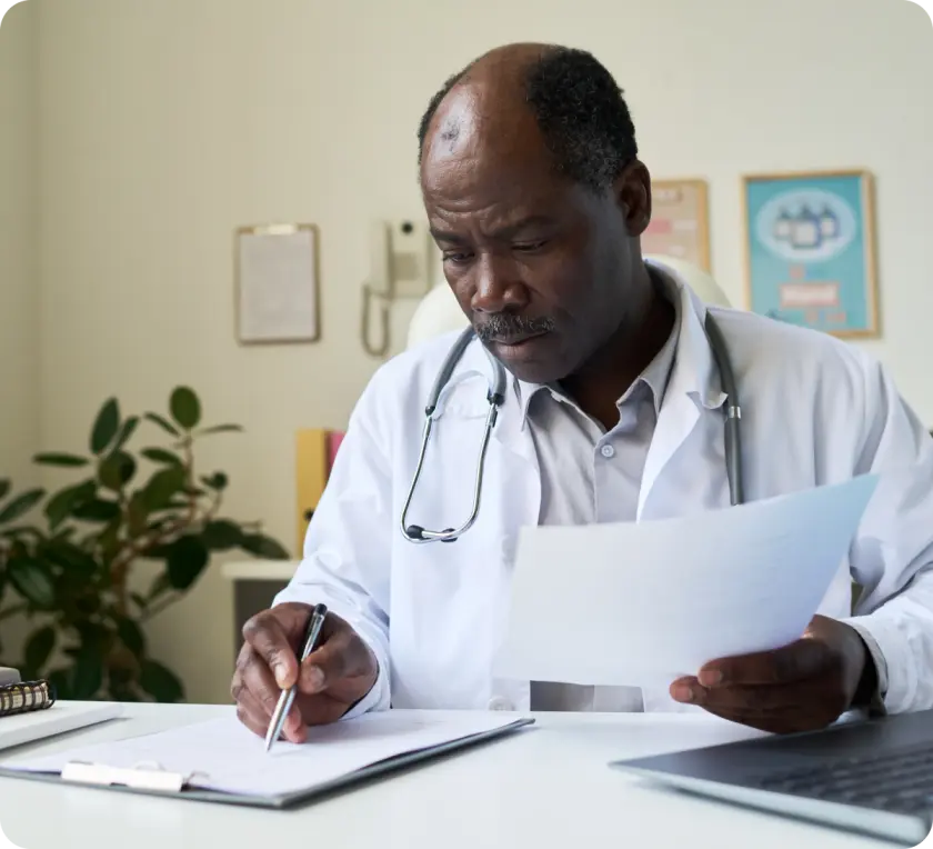 Functional medicine provider reviewing paperwork in California